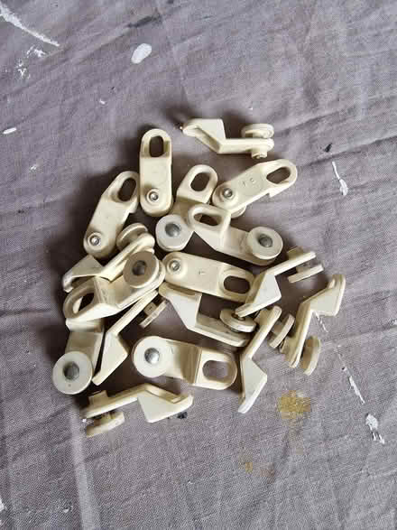 Photo of free 17 Old Curtain Track Gliders (Woking GU22 9) #1