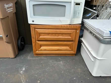 Photo of free Small two-drawer wooden nightstand (Valencia Avenue, Sunnyvale) #1