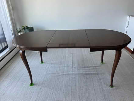 Photo of free Wood Dining Table (Downtown Vancouver, BC) #1