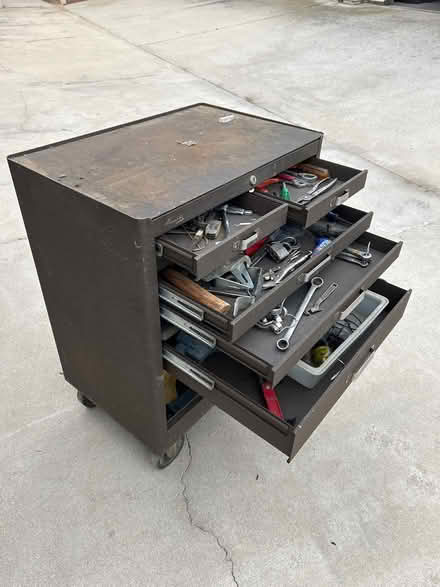 Photo of free Black metal toolbox with rollers (1008 Ardmore Circle Redlands) #1
