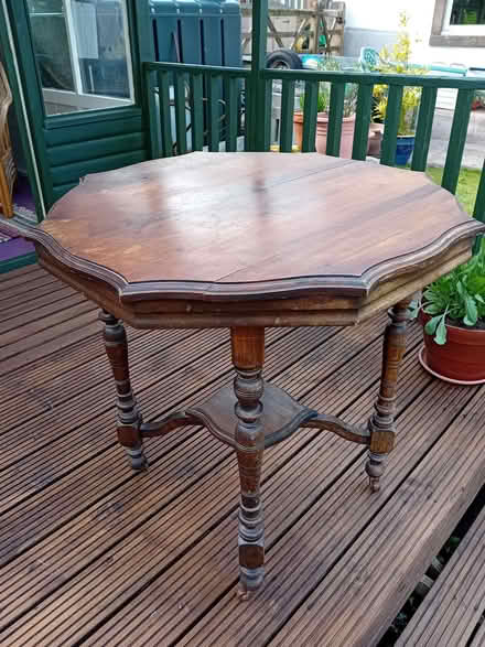 Photo of free Small wooden table on castors. (Skelton CA11) #1