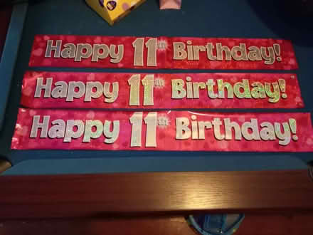 Photo of free 11th birthday banners, pink background, silver lettering. S3 (Burngreave S3) #1