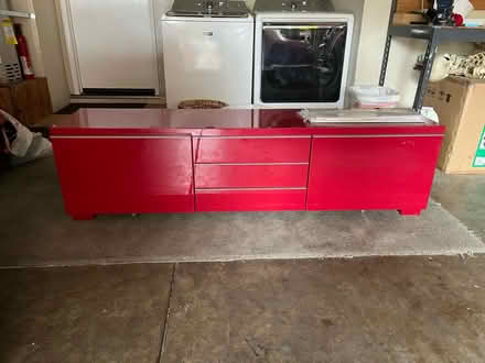 Photo of free Red media/tv cabinet (Live Oak area) #1