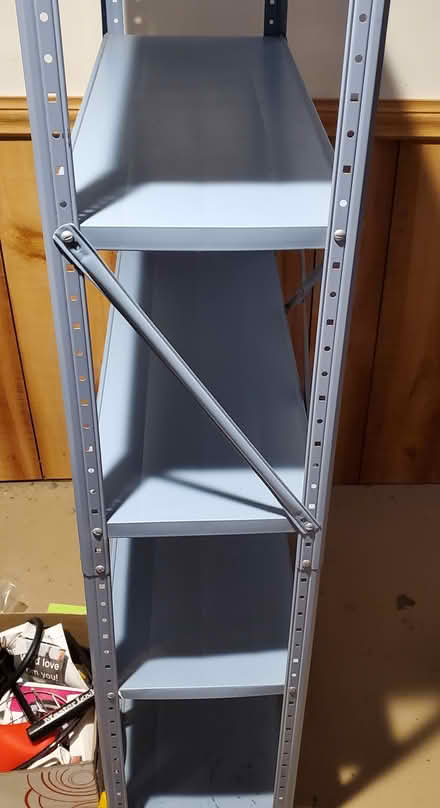 Photo of free Blue metal shelving unit (Ann Arbor Northwest Side) #1