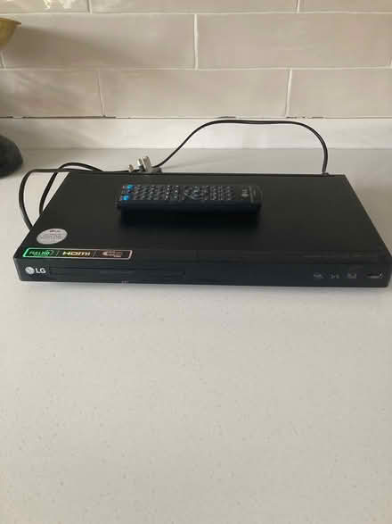 Photo of free DVD player and remote (GL6 Minchinhampton) #1