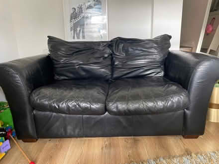 Photo of free Black leather two seated sofa (Herne Hill SE24) #2