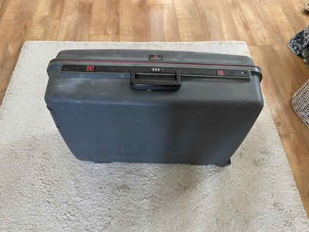 Photo of free Hardshell suitcase (Spacey Houses HG3) #1
