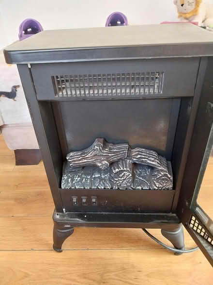 Photo of free Small wood effect electric fire (St helens Merseyside) #2