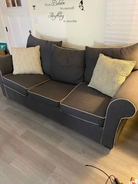 Photo of free Used gray sofa w/pillows (Glen Burnie) #1