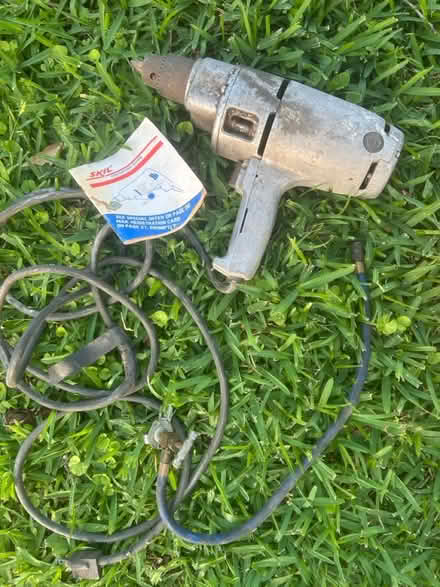 Photo of free Old Skil drill, axes, crow bar (Brookforest, SE Houston) #1