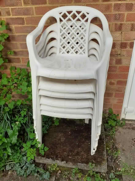 Photo of free 6 white plastic outside chairs (Lower Shiplake RG9) #2