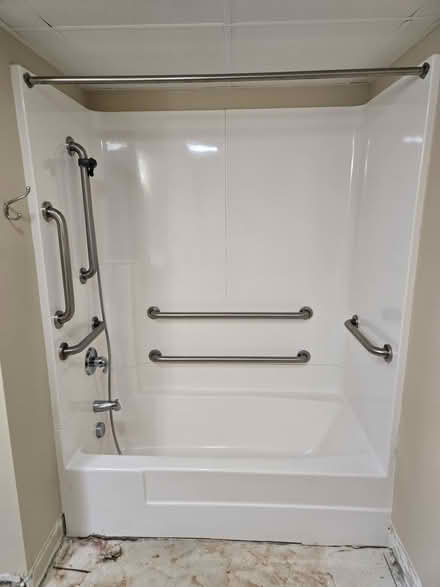 Photo of free Tub surround with handicap handles (12th street ocean city) #1