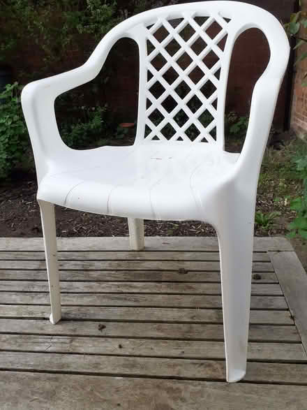 Photo of free 6 white plastic outside chairs (Lower Shiplake RG9) #1