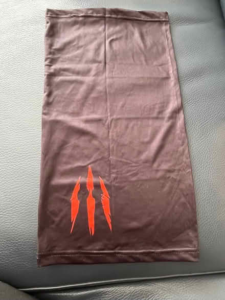 Photo of free NEW black Snood with monster claw detail (New Eltham SE9) #1