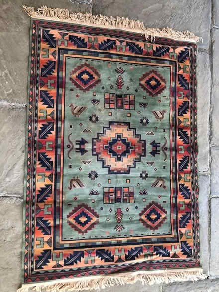 Photo of free Fringed rug - will be binned Weds (Marton) #1