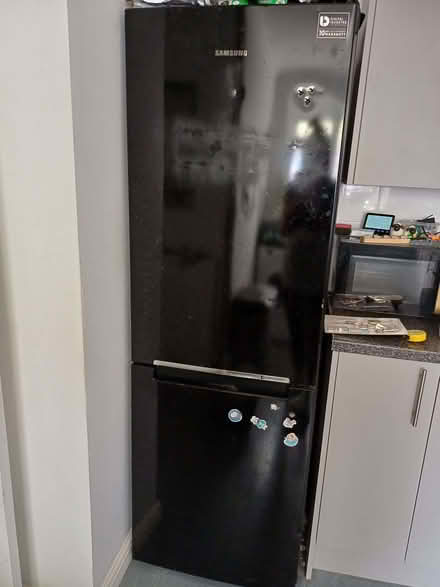 Photo of free Black Samsung fridge freezer (Potter Heigham NR29) #1