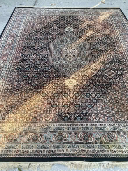 Photo of free 8X10 area rug (Hammock area of Palm Coast) #4