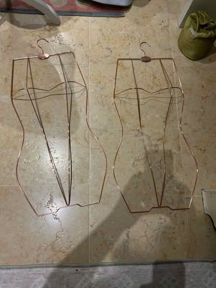 Photo of free 2 metal clothes display hangers (Battersea SW11) #1