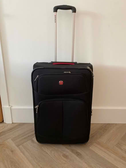 Photo of free Large suitcase (West Didsbury Manchester M20) #1