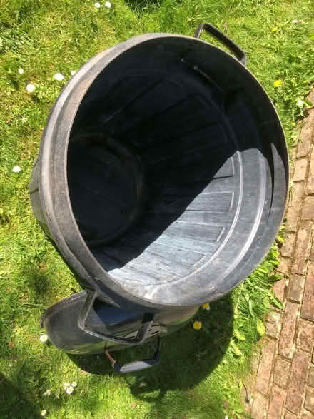 Photo of free Black bin with improvised Weber BBQ lid (Dereham Rd area NR2) #1