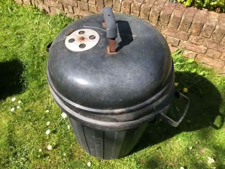Photo of free Black bin with improvised Weber BBQ lid (Dereham Rd area NR2) #2