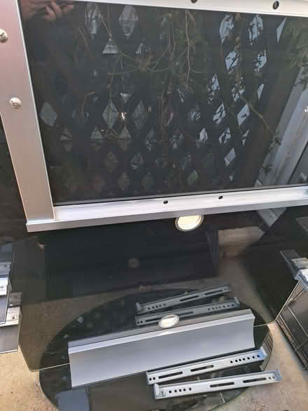 Photo of free Black glass TV unit with 2 shelves (Blackbird Leys OX4) #1