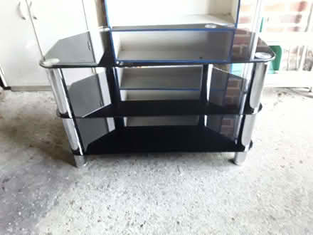 Photo of free Corner Tv stand in Glass and chrome. Guildford GU1 (Burpham GU1) #1