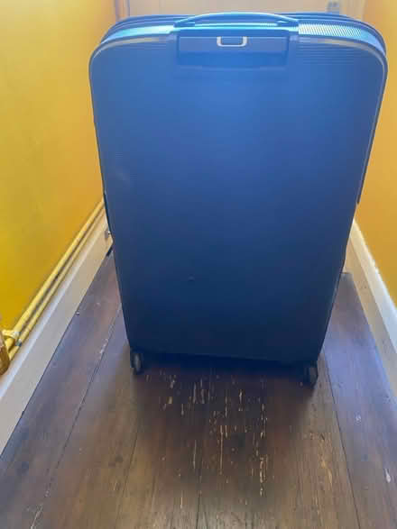 Photo of free Large suitcase - one sticky wheel (Queens Park W10) #1