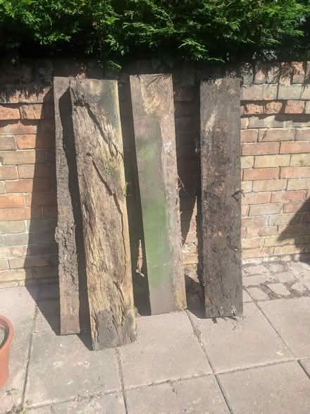 Photo of free 4 wooden sleepers (SG19) #1