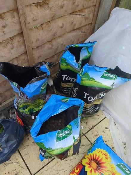 Photo of free 4 half full bags of pebbles (Church crookham) #2