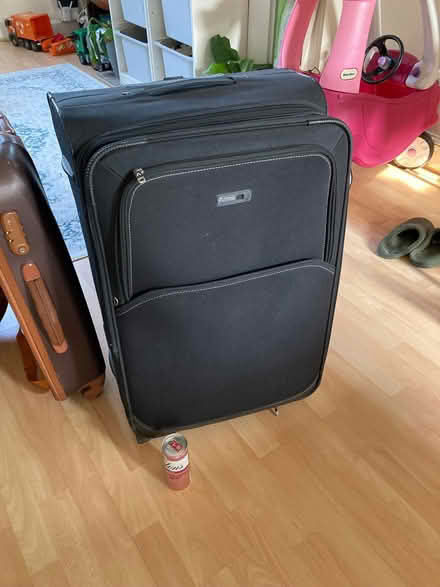 Photo of free Large black 2 wheeler suitcase. Good working condition (Southfields SW18) #1