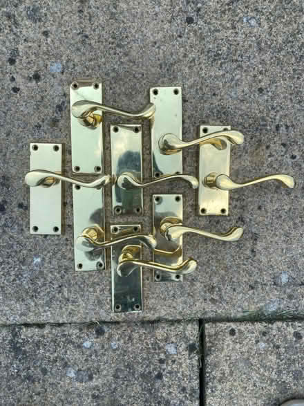 Photo of free 8 Brass/gold door handles (PE3 Bretton) #1