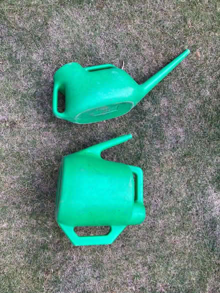 Photo of free 2 green plastic watering cans (Southfields SW18) #1