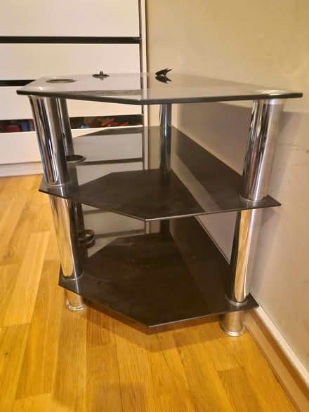 Photo of free Black glass tv unit (Orton Waterville) #2