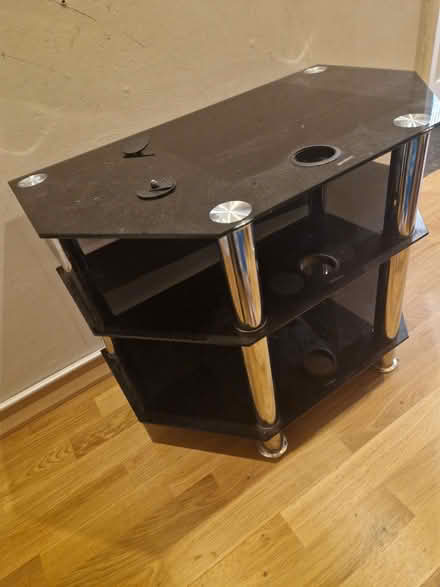 Photo of free Black glass tv unit (Orton Waterville) #1
