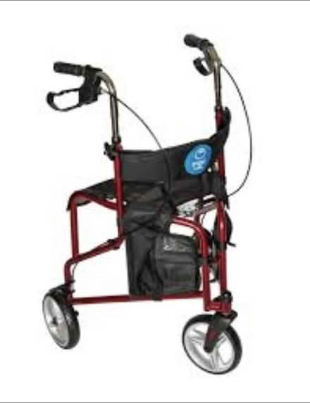 Photo of A 3 or 4 wheeled walker with a seat (Braughing, SG11) #2