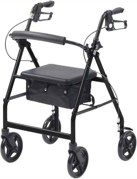 Photo of A 3 or 4 wheeled walker with a seat (Braughing, SG11) #1