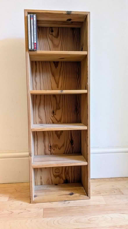 Photo of free Pine CD shelving unit (Epsom (Wells Estate)) #1