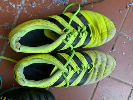 Photo of free Yellow rugby boots - Size 10 - used (Heath) #1