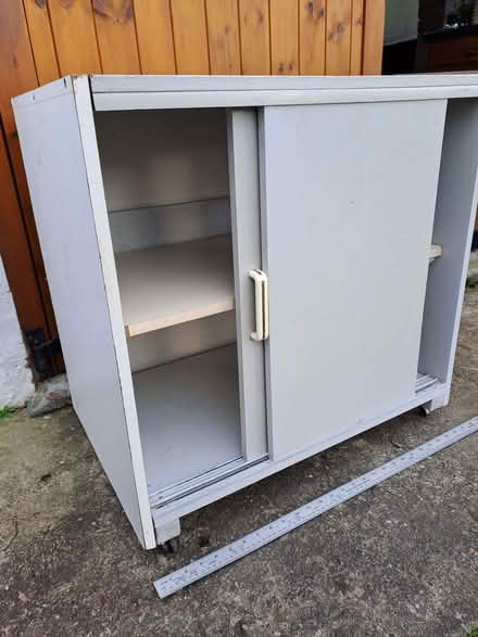 Photo of free Low cabinet with sliding doors and casters (Pentre Berw LL60) #2