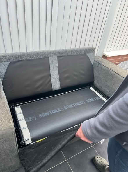 Photo of free Two seater sofa bed grey velour material (Woodville DE11) #3