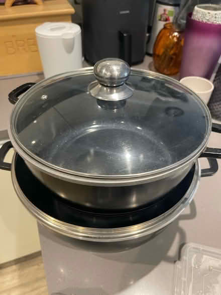 Photo of free Two pots with lids 28cm and 32 cm (Woking) #1