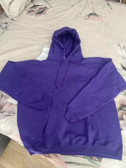 Photo of free New men’s fleece hoodie (Northwest Livonia) #1