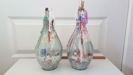 Photo of free 2 wine bottle candle holders (Edmonstone Policies Park EH16) #1