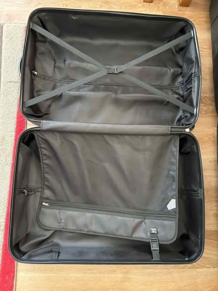 Photo of free Large hard shell suitcase. (Spital CH63) #1