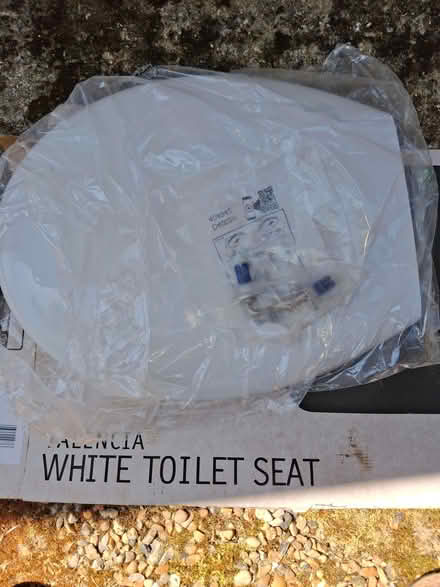 Photo of free New unused white plastic toilet seat with fittings (Halstead TN14) #1