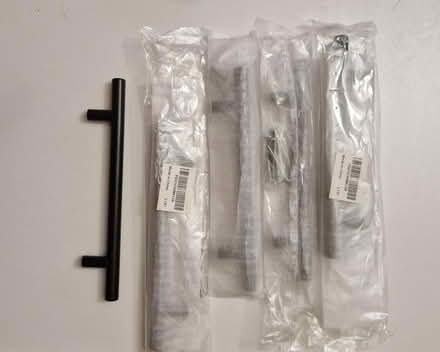 Photo of free 5x black handles (Tw14) #1
