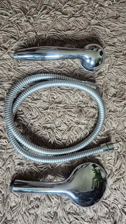 Photo of free Two showerheads and a hose (Norcot RG30) #2