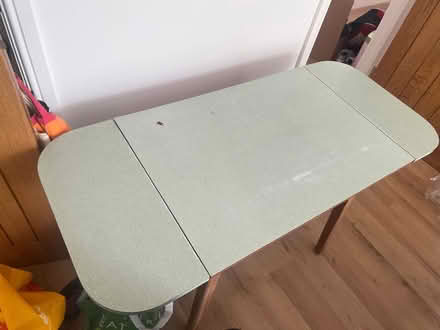 Photo of free Light green Formica drop leaf table (damaged) (Portslade Village BN41) #1
