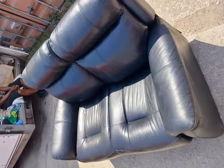Photo of free 2 seater sofa black (Wembley) #1